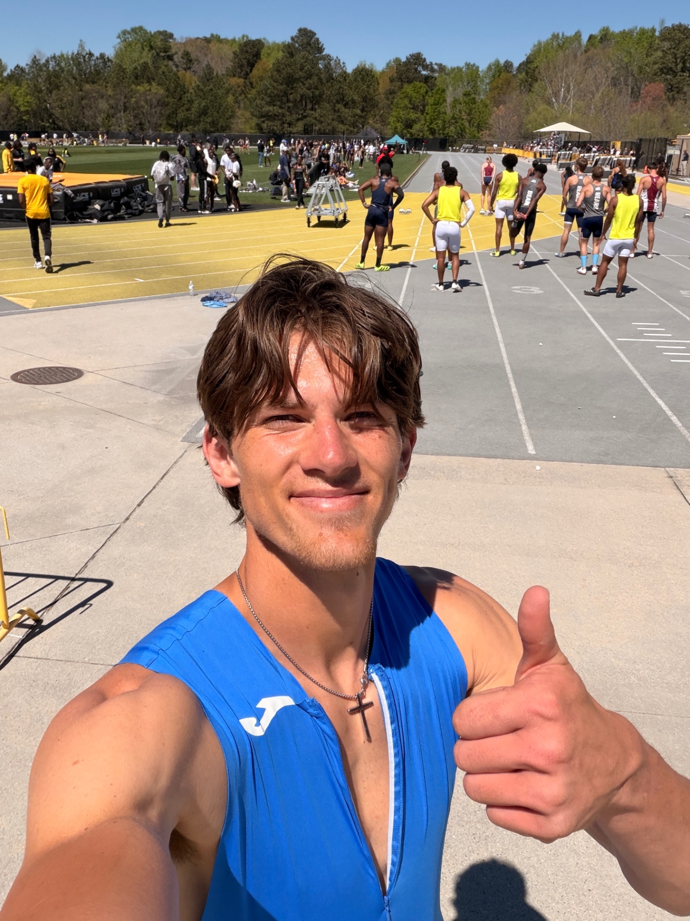 Isaiah Hudgens smiling at his first post-collegiate track meet